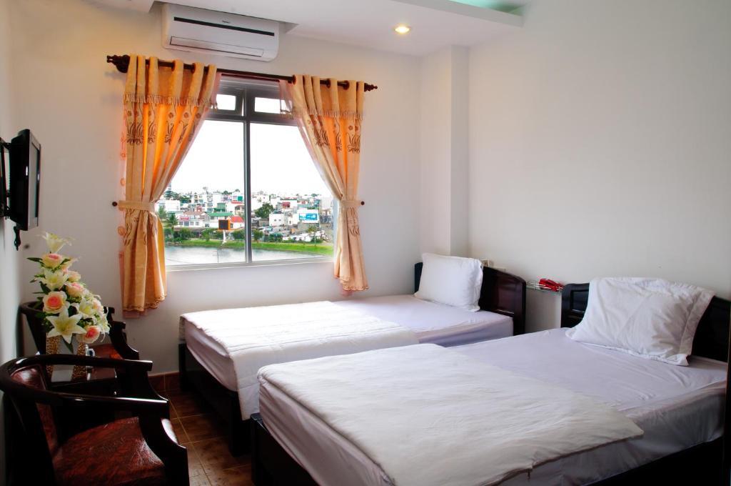 Minh Quan Hotel Bao Loc Quarto foto