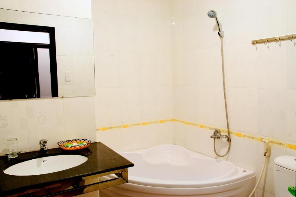 Minh Quan Hotel Bao Loc Quarto foto