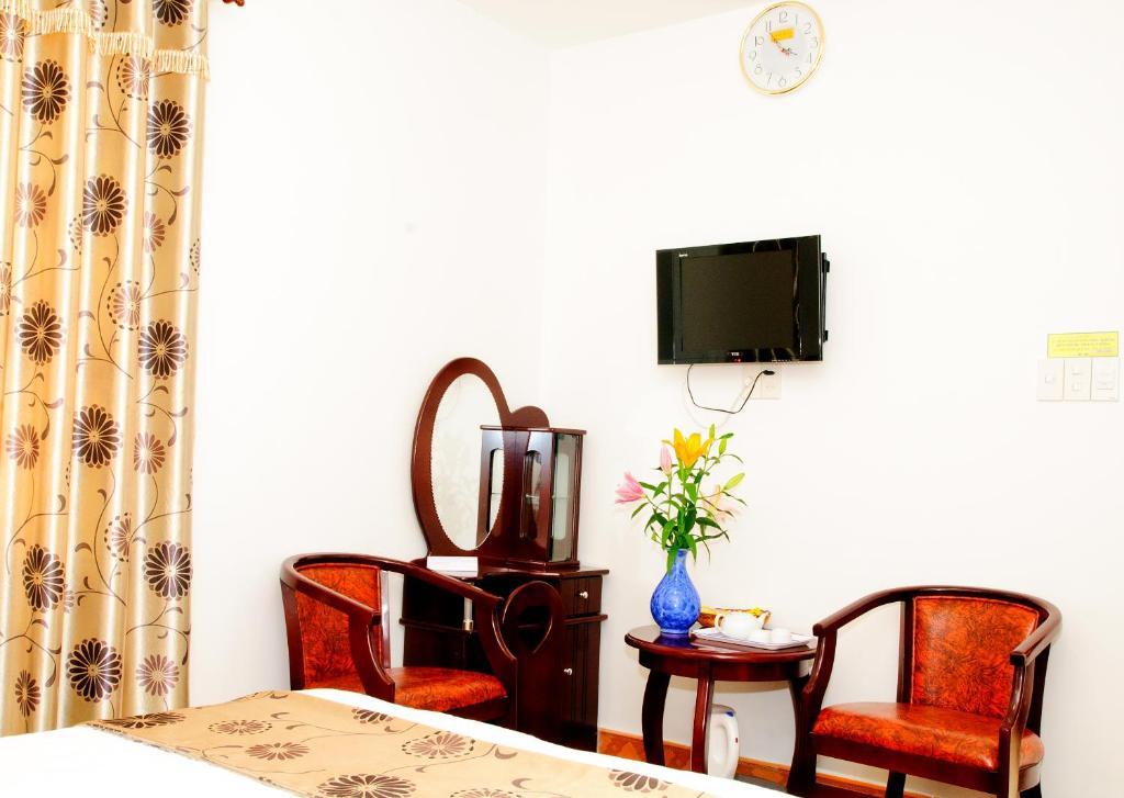 Minh Quan Hotel Bao Loc Quarto foto